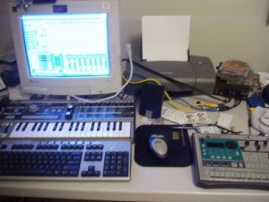 This was my setup in 2005.  I was incredibly messy back then. Just looking at all that clutter gives me the jibblies now. 